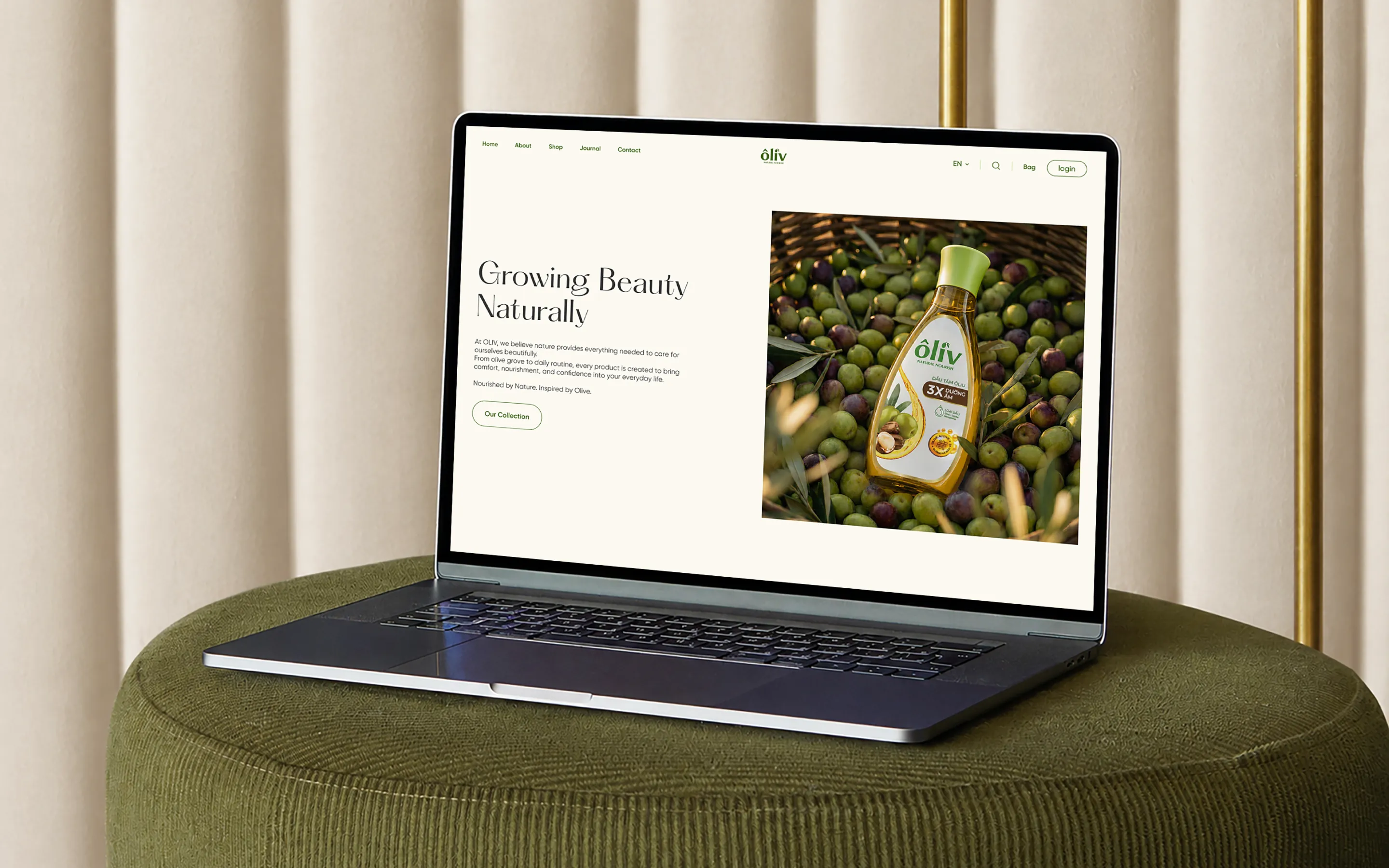 Oliv homepage hero shown on a laptop